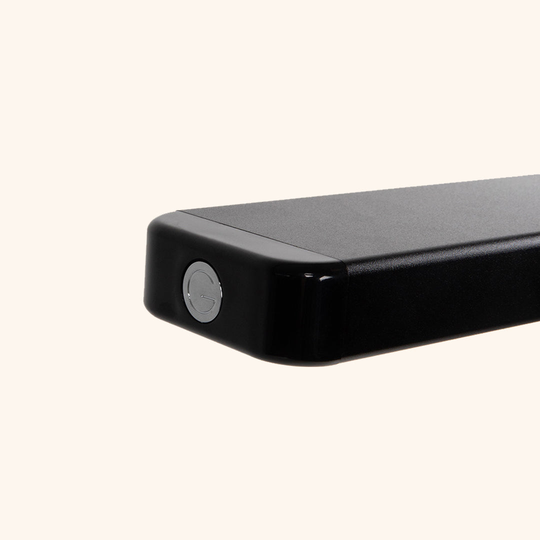 Glamcor Reveal Light clipped on a table