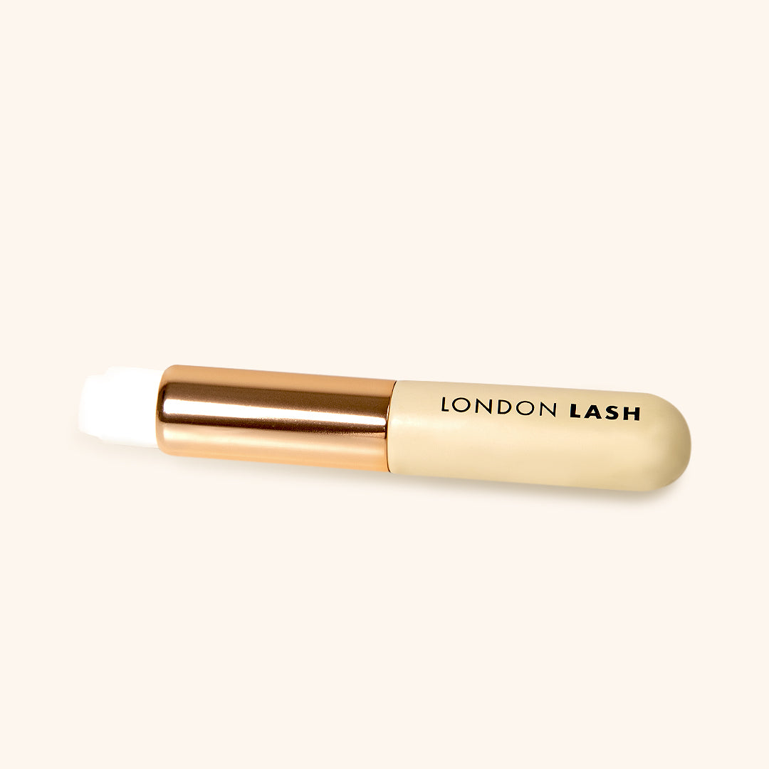 Lash Shampoo Brush from London Lash, travel-sized, perfect for on-the-go lash and brow cleansing.